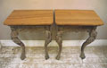 pair of antique carved wooden console tables
